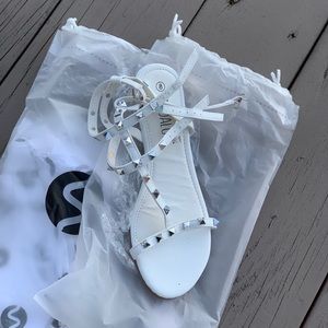 White gladiator sandals with studs
